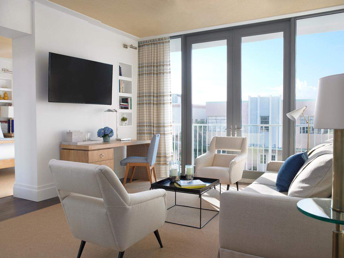 The living room and double balcony at a suite at the Betsy Hotel-South Beach.