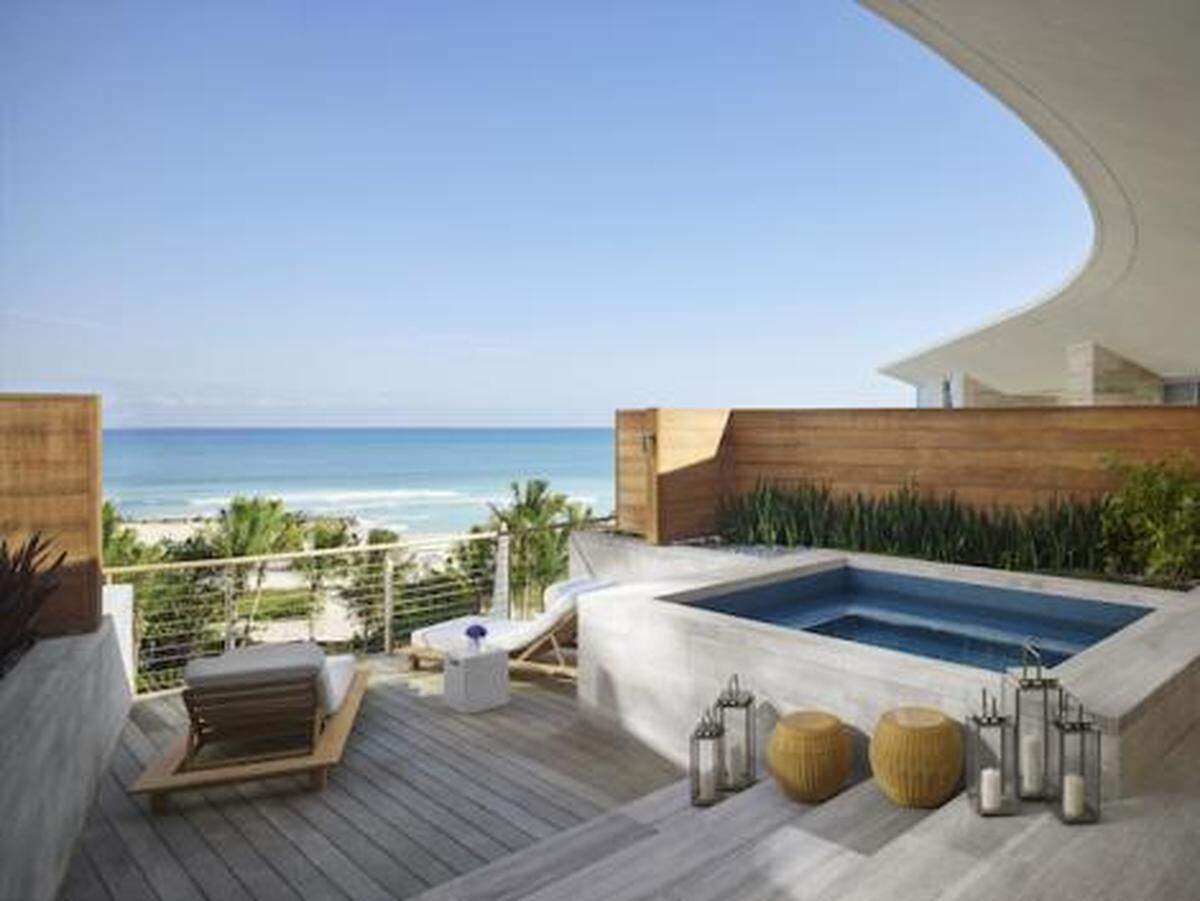 Some bungalows boast rooftop soaking tubs.
