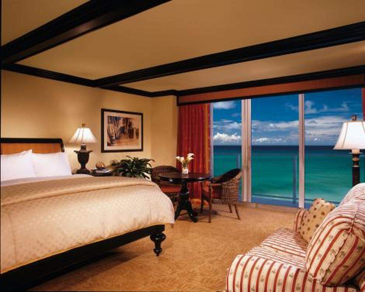 A guest room with ocean views at Jupiter Beach Resort &amp; Spa.