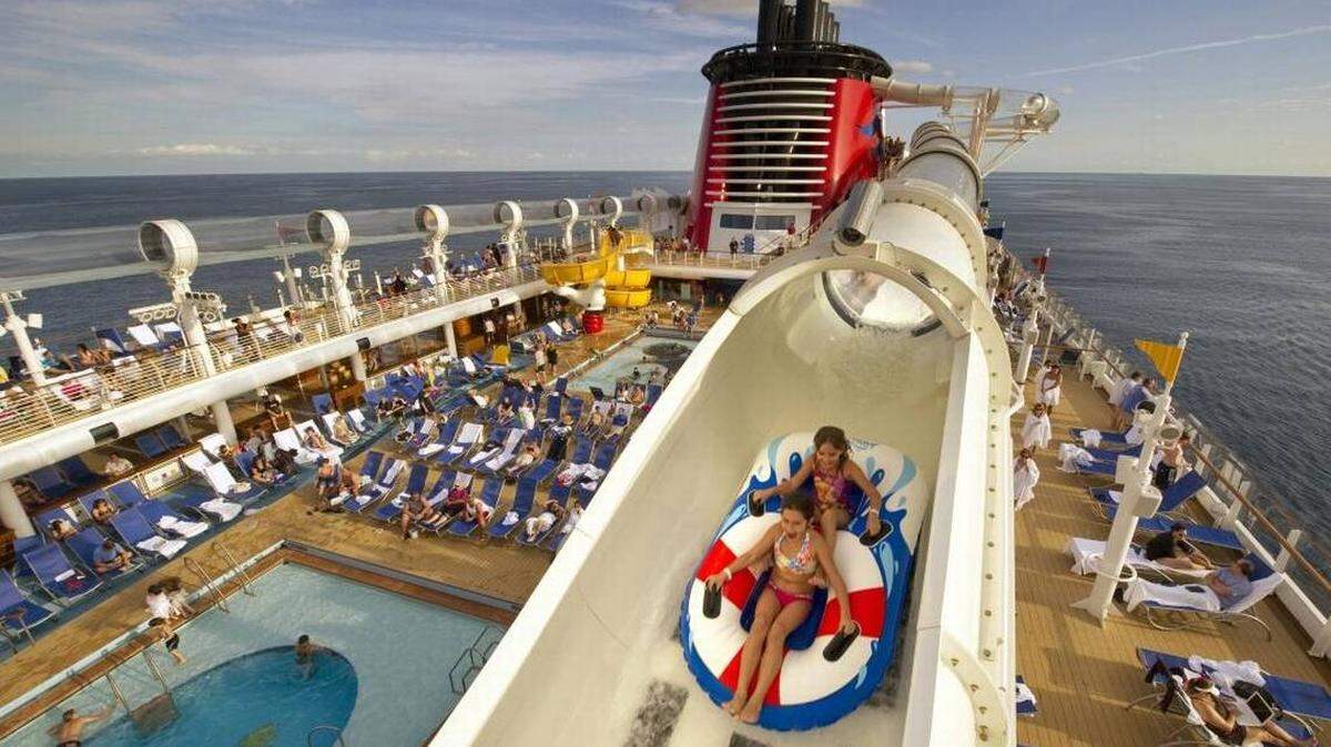 Disney Cruise Line introduces a cruise industry innovation on the Disney Fantasy with the shipboard water coaster AquaDuck. Stretching 765 feet in length and spanning four decks in height, AquaDuck uses powerful water blasters to propel guests around the perimeter of the ship to the top deck.