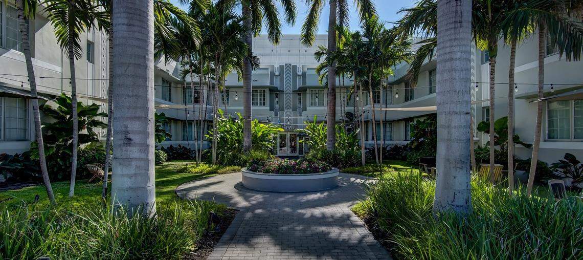 The front courtyard and facade of South Beach Hotel.