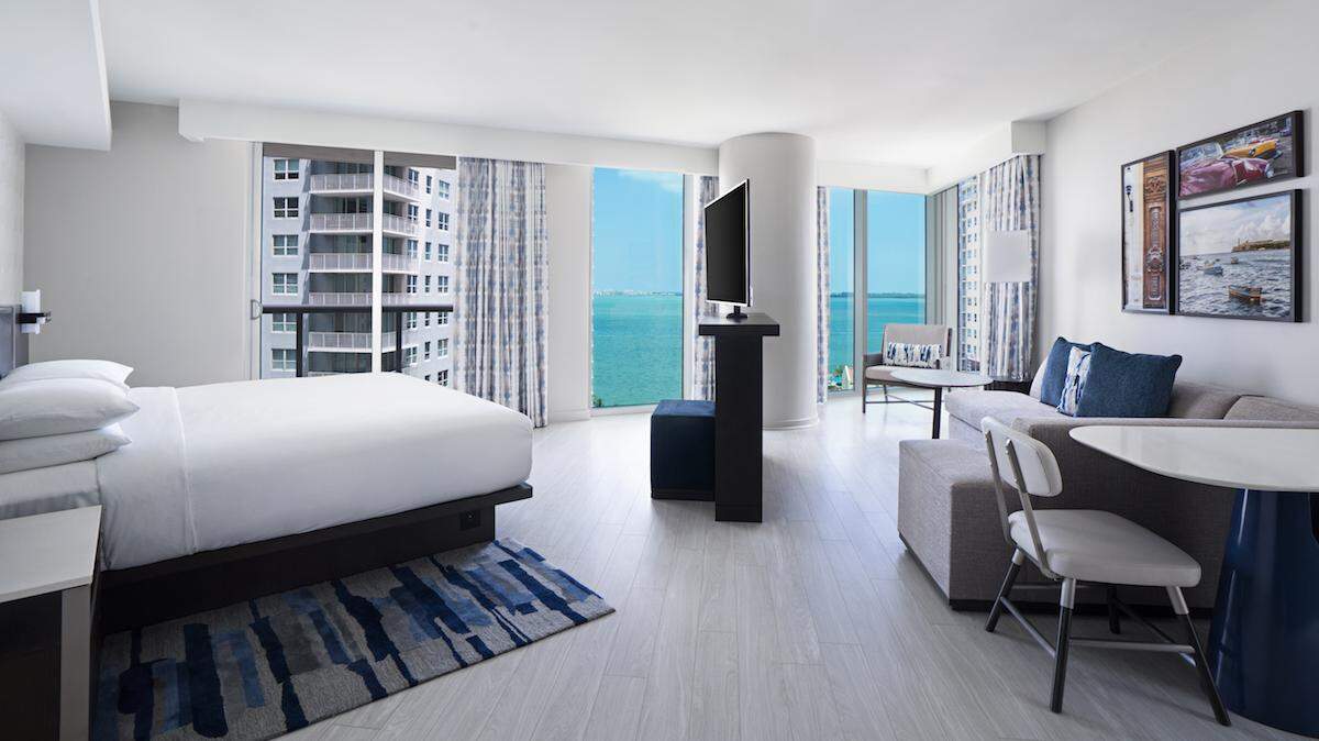 A corner guest room at the new Hyatt Centric Brickell offers panoramic views of Biscayne Bay.