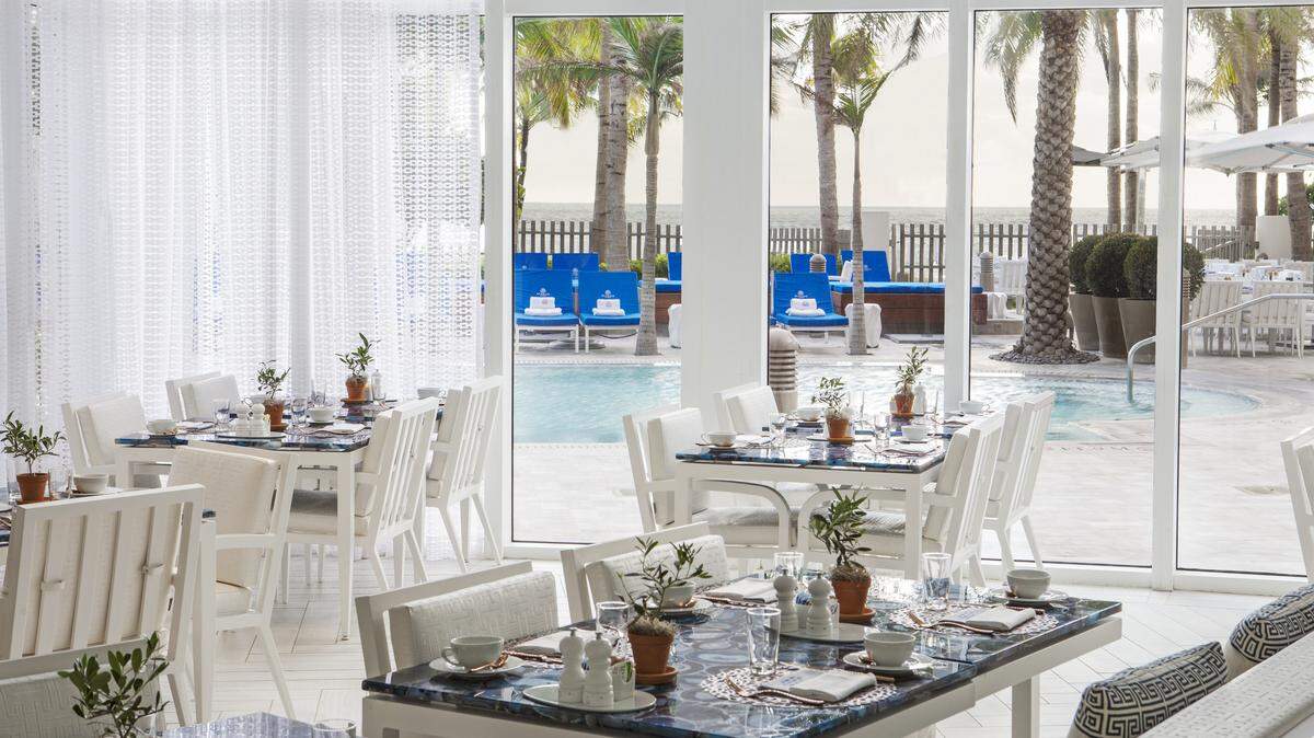 The dining room at Atlantikós, a new Greek restaurant at The St. Regis