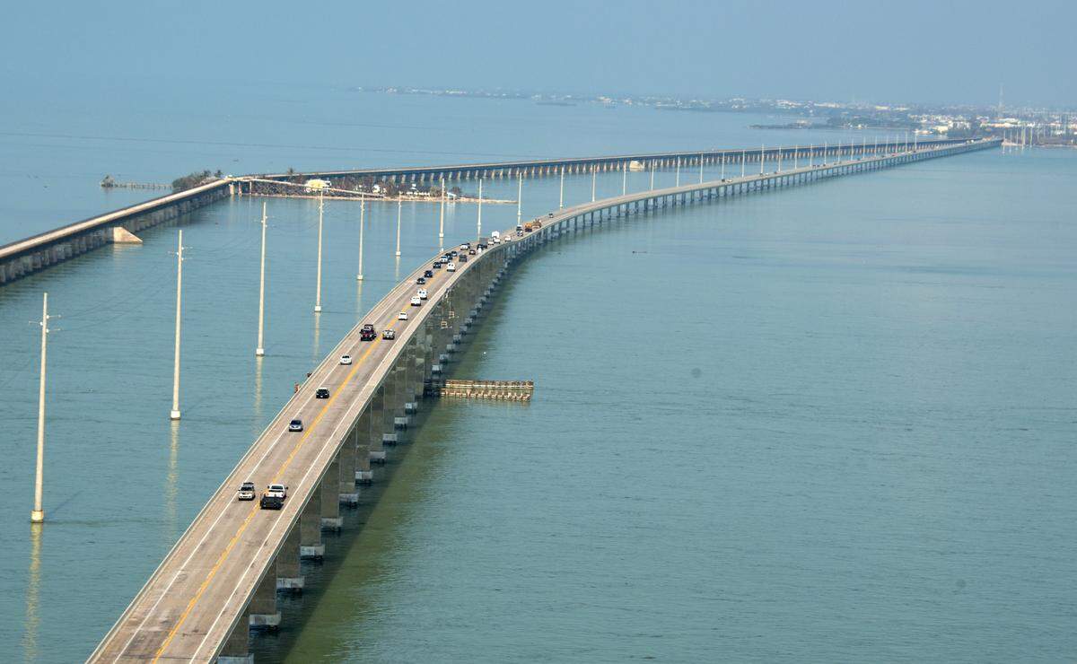 Traffic rolls on the Seven Mile Bridge near Marathon, Fla., Tuesday, Sept. 19, 2017.