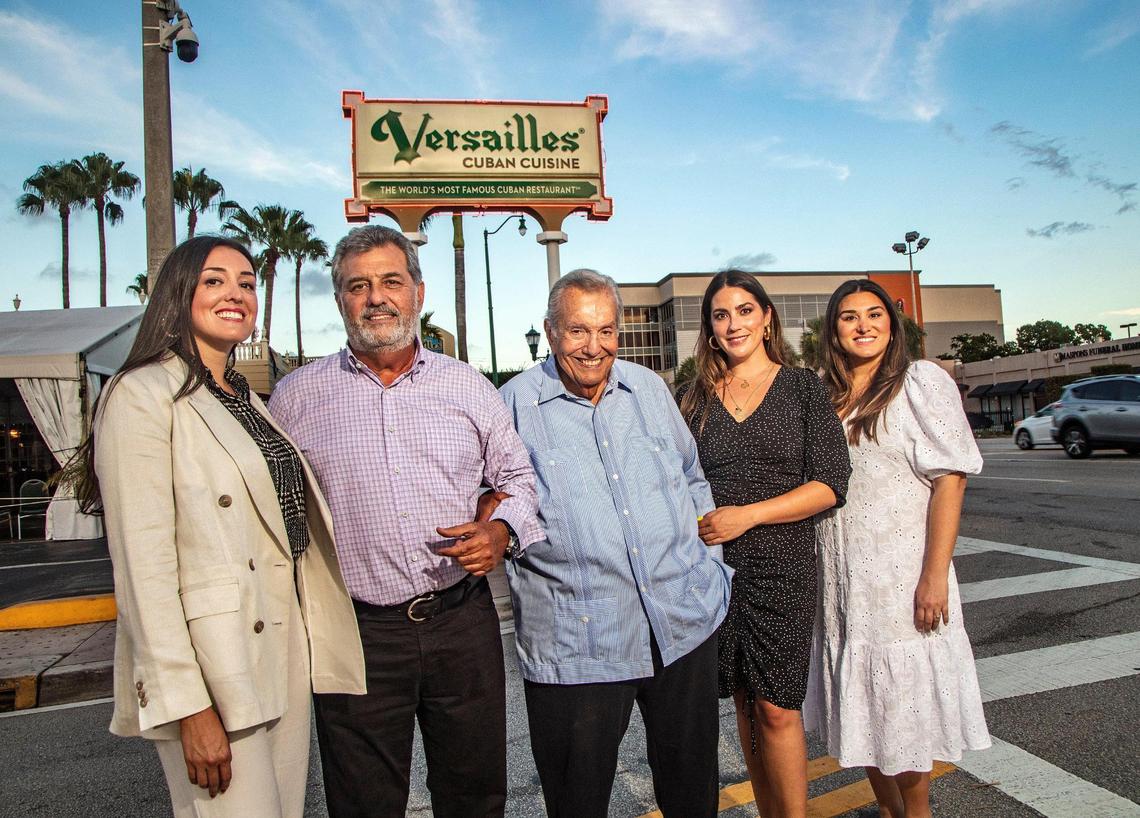Felipe Valls Sr., founder of Versailles, with his son Felipe Valls Jr., and granddaughters, from left, Nicole, Luly and Desirée, in front of the restaurant located on Calle Ocho in Little Havana.