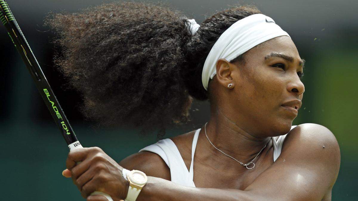 Serena Williams of the United States makes a return at Wimbledon’s All England Club in London on July 6, 2015. Seven years later, Williams, now 40, will play Wimbledon this month in her first tournament in a year.