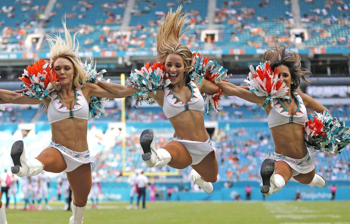 Dolphin cheerleaders perform as the Miami Dolphins host the Tennessee Titans at Hard Rock Stadium on Sunday, October 9, 2016.