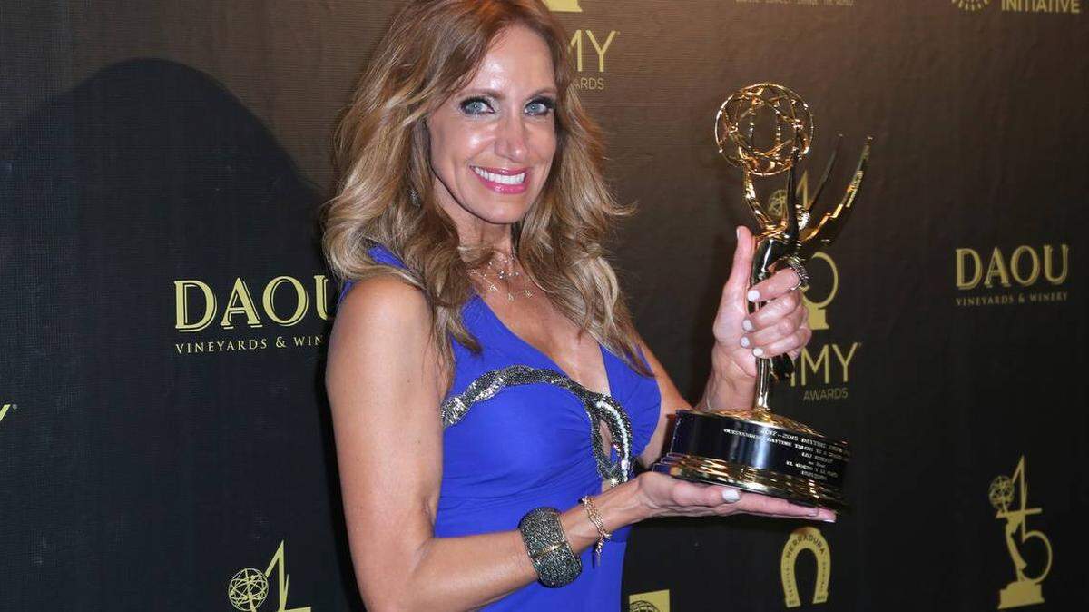 Lili Estefan poses for a photo after receiving the Emmy at the 45th Daytime Emmy Awards in Pasadena, California, on April 29.
