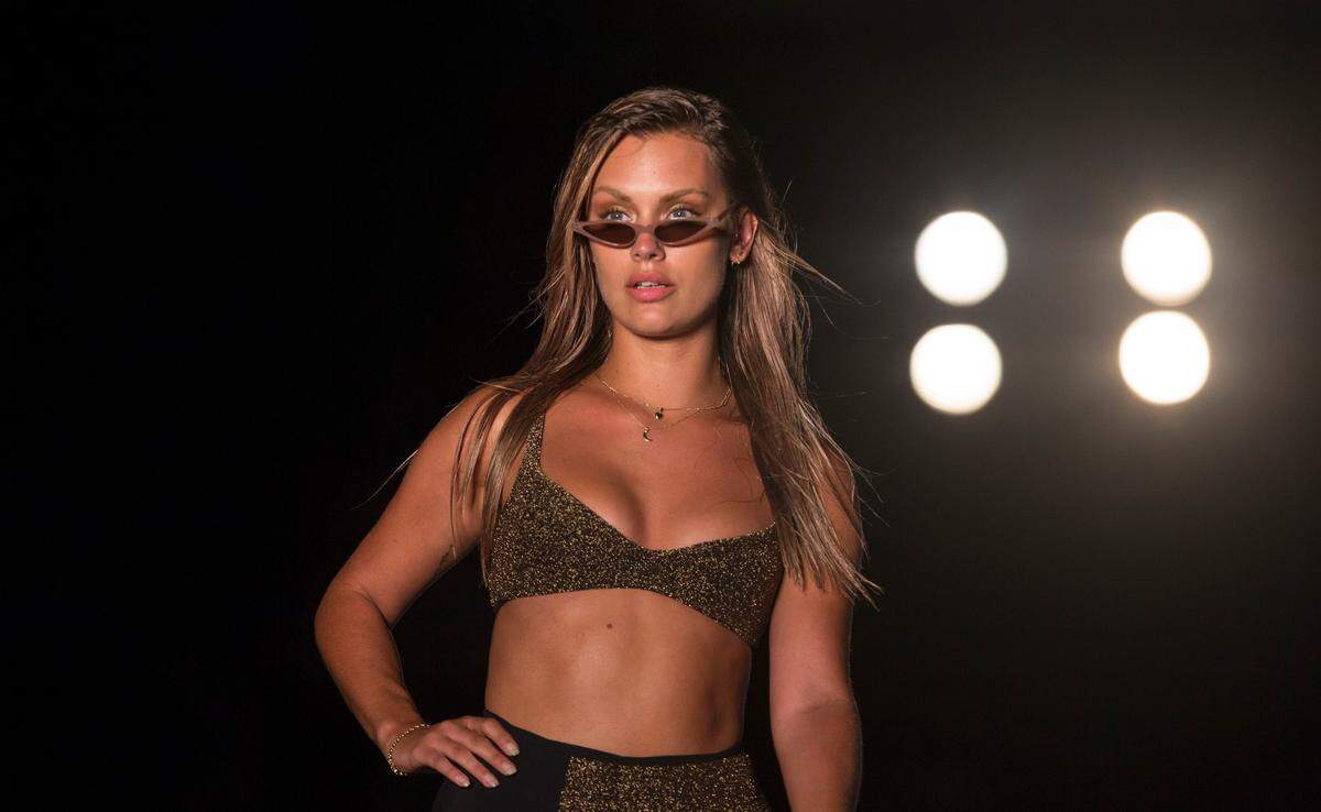 A model walks the runway for the 2018 Sports Illustrated Swimsuit show at PARAISO during Miami Swim Week at The W Hotel South Beach in Miami Beach, FL, on July 15, 2018.
