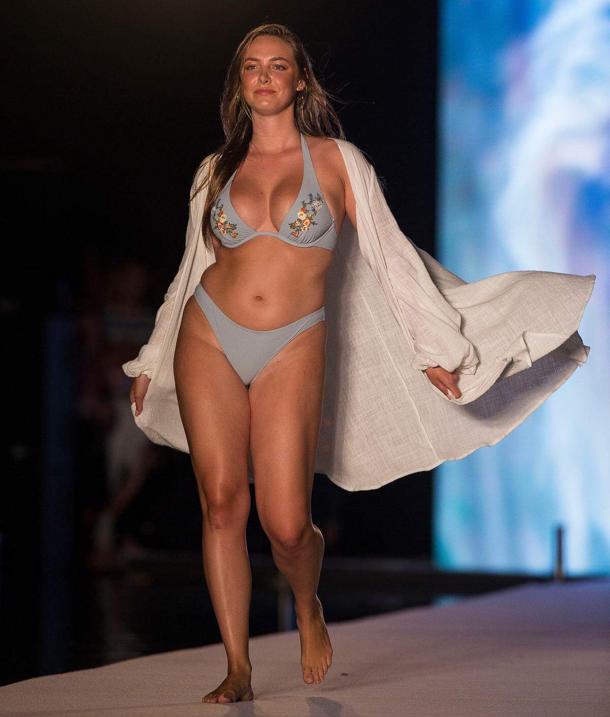 A model walks the runway for the 2018 Sports Illustrated Swimsuit show at PARAISO during Miami Swim Week at The W Hotel South Beach in Miami Beach, FL, on July 15, 2018.
