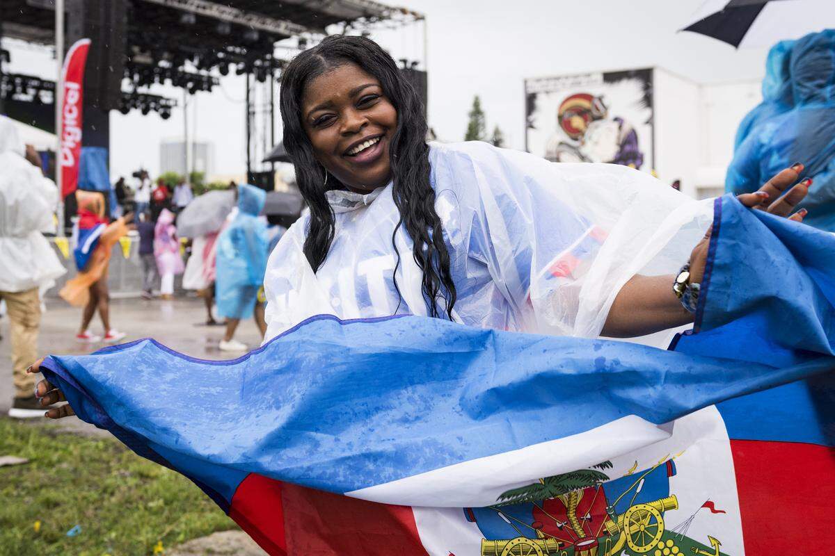 Fans of Haitian music refused to let South Florida’s wet weather prevent them from attending the Haitian Compas Festival Saturday at Mana Wynwood in Miami. The premier showcase for Haitian music and culture in the United States, the festival is celebrating 20 years.
