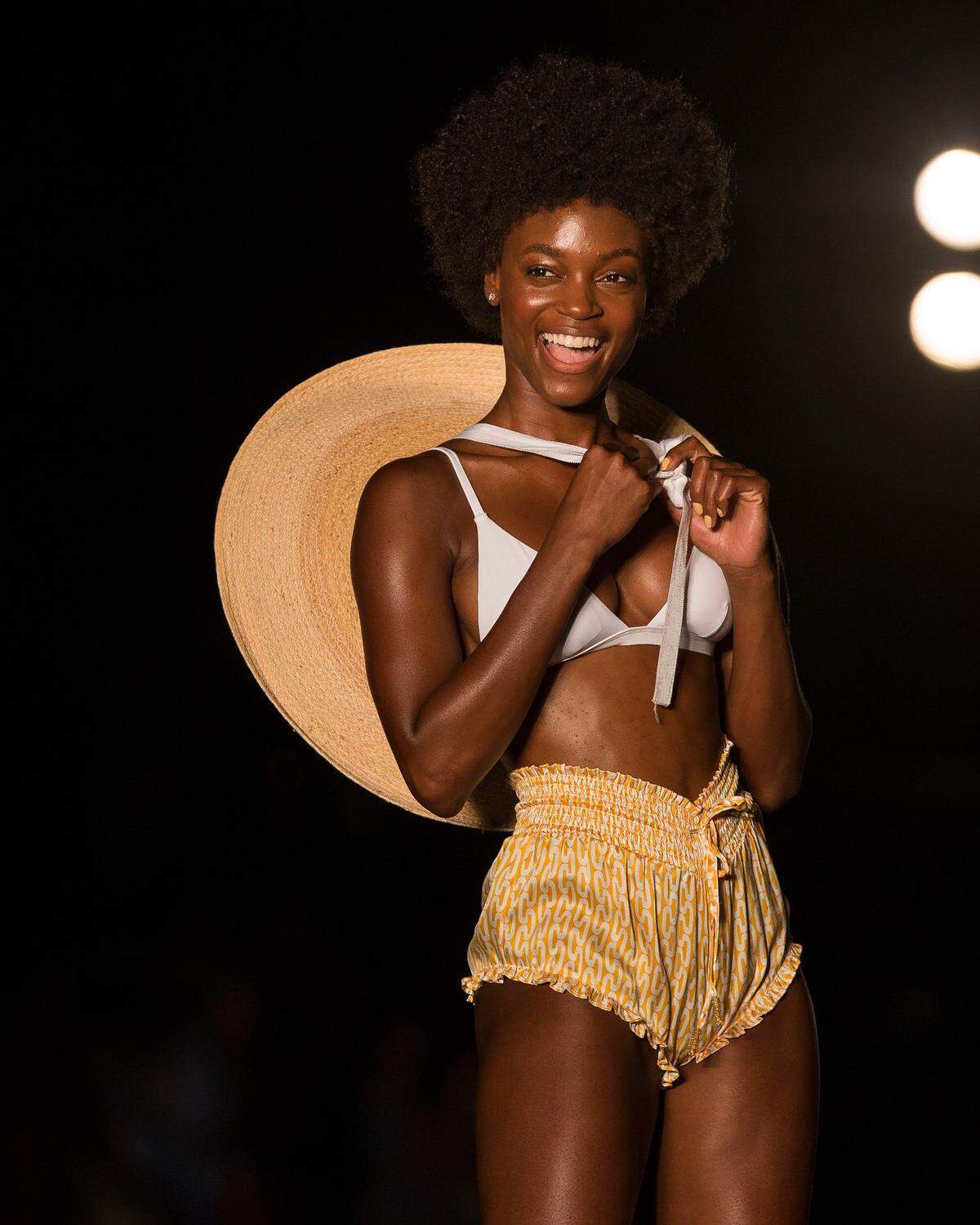 A model walks the runway for the 2018 Sports Illustrated Swimsuit show at PARAISO during Miami Swim Week at The W Hotel South Beach in Miami Beach, FL, on July 15, 2018.