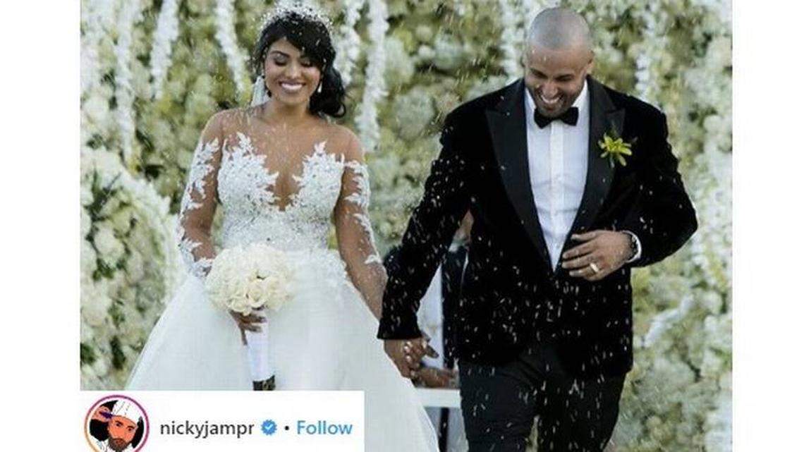 Nicky Jam and his wife.