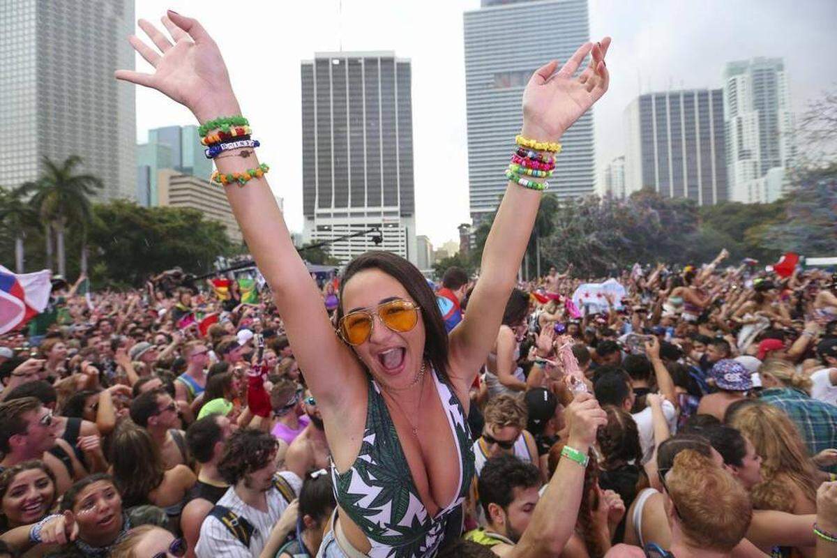 Guests dance during the second day of Ultra Music Festival in downtown Miami on Saturday, March 25, 2017.