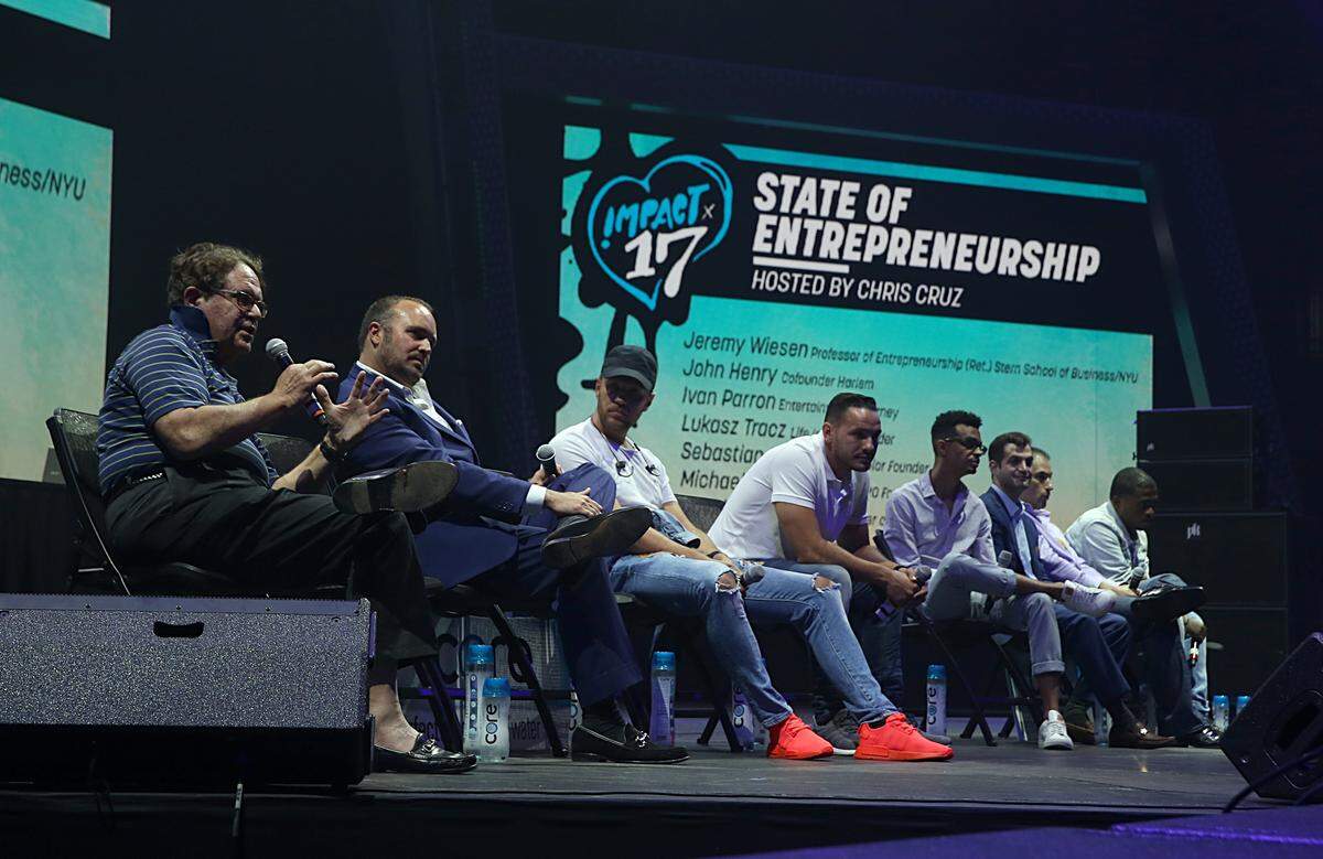 Panelists take time answering questions at the "State of Entrepreneurship panel" during the IMPACT '17 Conference, a one-day annual event centered around music, technology, fashion and art, at the University of Miami Watsco Center in Coral Gables on Thursday June 29, 2017.