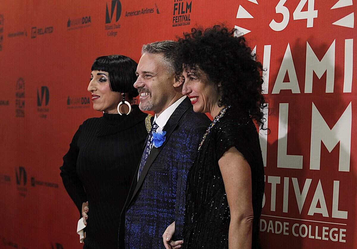 Festival director Jaie Laplante, posed with movie star actress Rossy De Palma (left) and director Jessica Mitrani as they arrived at the red carpet for the presentation of the Traveling Lady, a short film by Colombian-born director Jessica Mitrani at the 34th Miami International Film Festival at the Olympia Theater in Miami, on Saturday March 04, 2017.