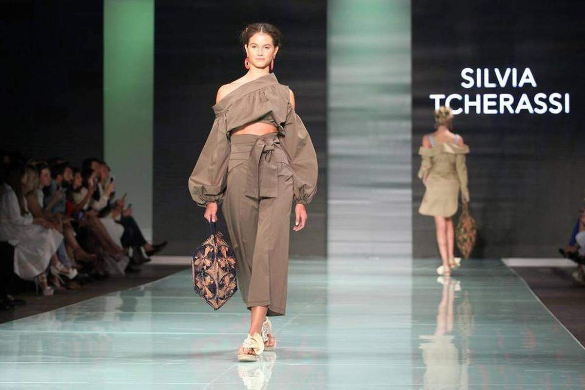 Fashion models work the runway wearing the fashion line by Miami designer Silvia Tcherassi inside the Ice Palace during Miami Fashion Week on Thursday, June 1, 2017.