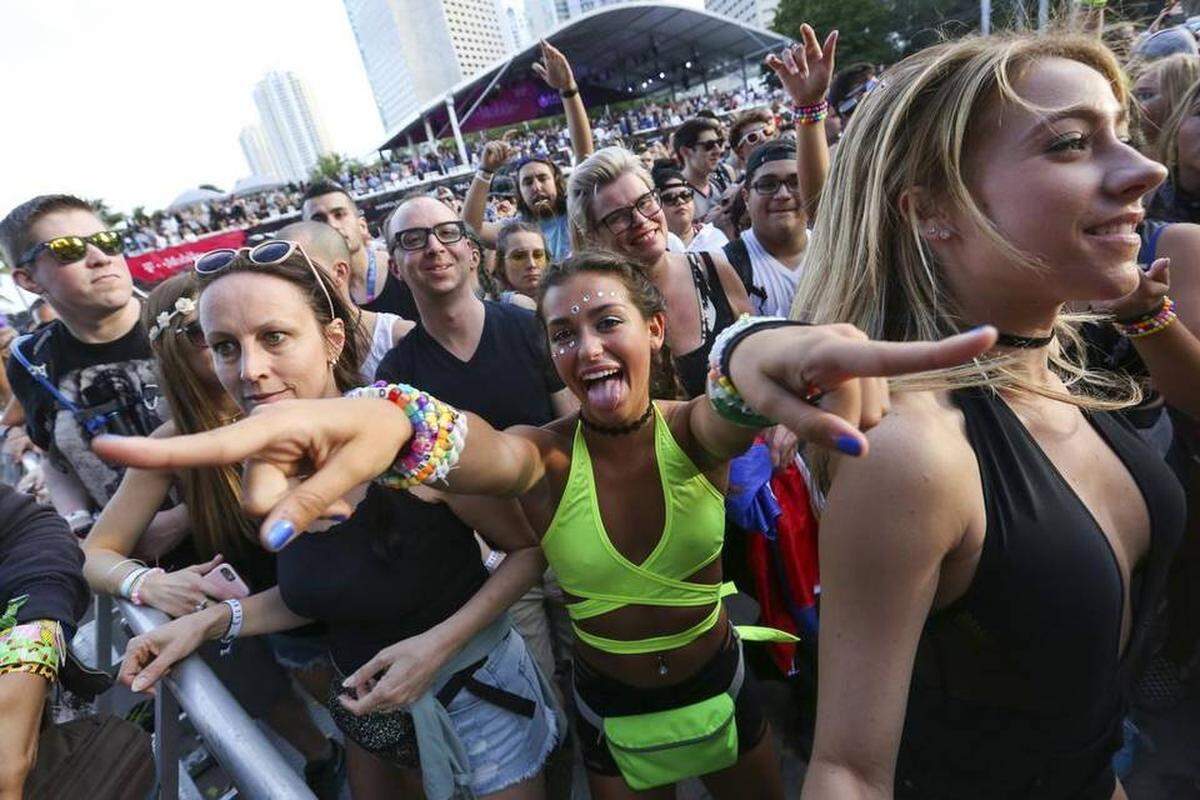 Guests dance during the first day of the Ultra Music Festival in Bayfront Park on Friday, March 24, 2017.