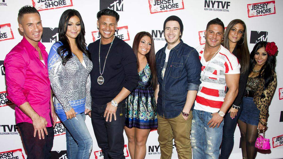 Jersey Shore" cast members, from left, Mike "The Situation" Sorrentino, Jenni "JWoww" Farley, Paul "Pauly D" Delvecchio, Deena Cortese, Vinny Guadagnino, Ronnie Ortiz-Magro, Sammi "Sweetheart" Giancola and Nicole "Snooki" Polizzi at a panel entitled "Love, Loss, (Gym, Tan) and Laundry: A Farewell to the Jersey Shore" in New York. MTV announced that most of the original cast would return to the network for "Jersey Shore Family Vacation," a relaunch of the series set to debut in 2018. (Charles Sykes / Invision)