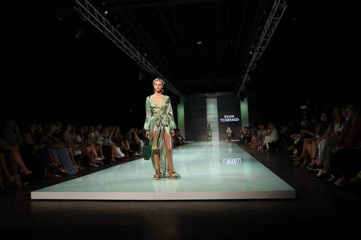 Fashion models work the runway wearing the fashion line by Miami designer Silvia Tcherassi inside the Ice Palace during Miami Fashion Week on Thursday, June 1, 2017.