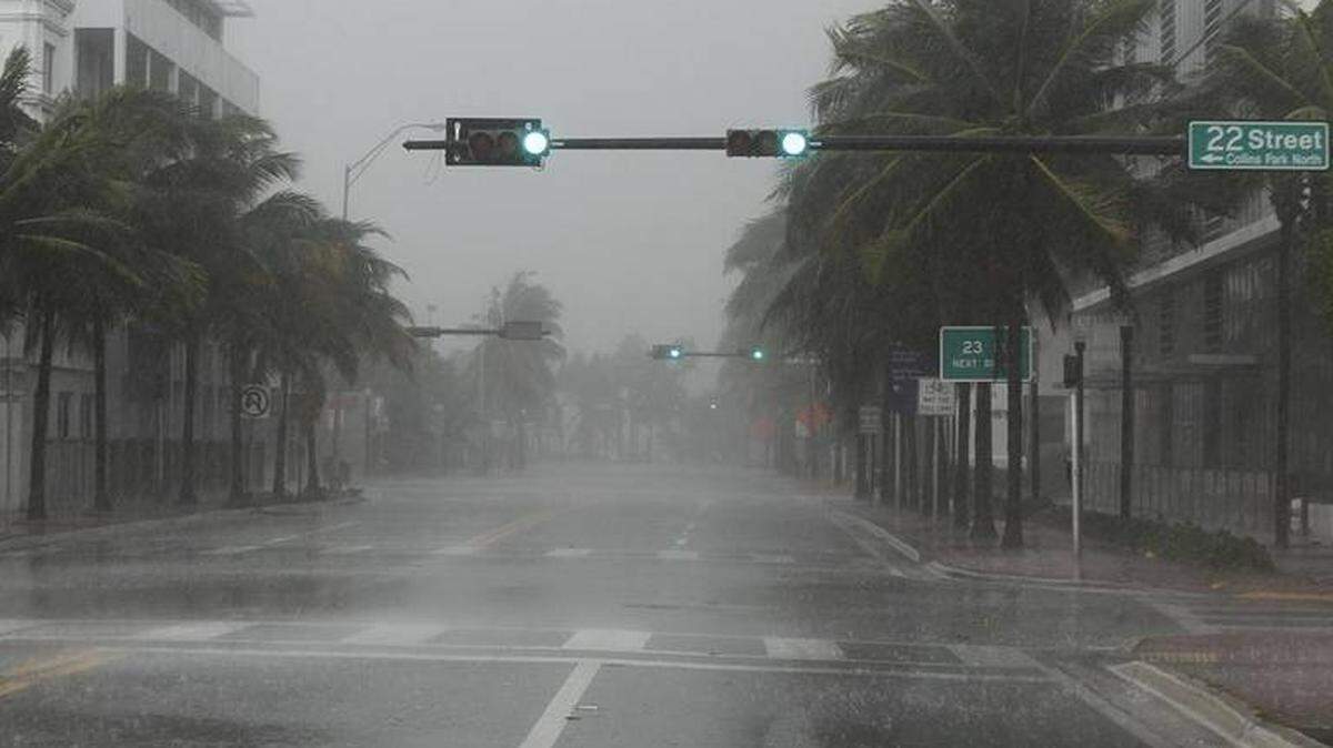 A view of a rainy wind gust at Collins Avenue and 22nd Street in Miami Beach as Hurricane Irma began to approach Saturday.