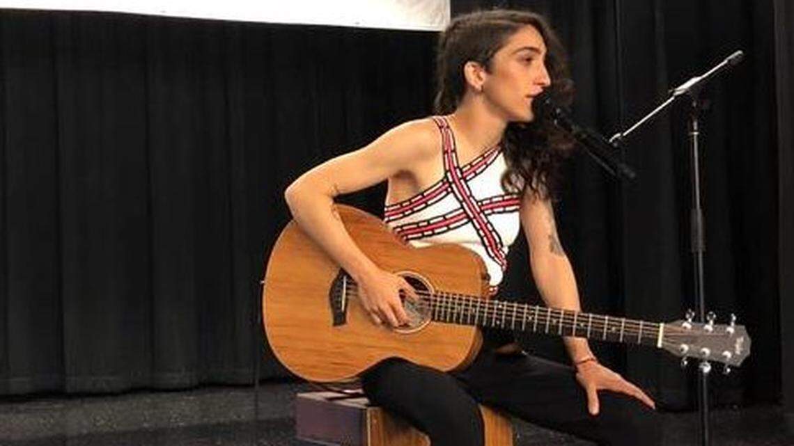 Emily Estefan sang several of her songs to kids at Henry H. Filer Middle School in Hialeah.
