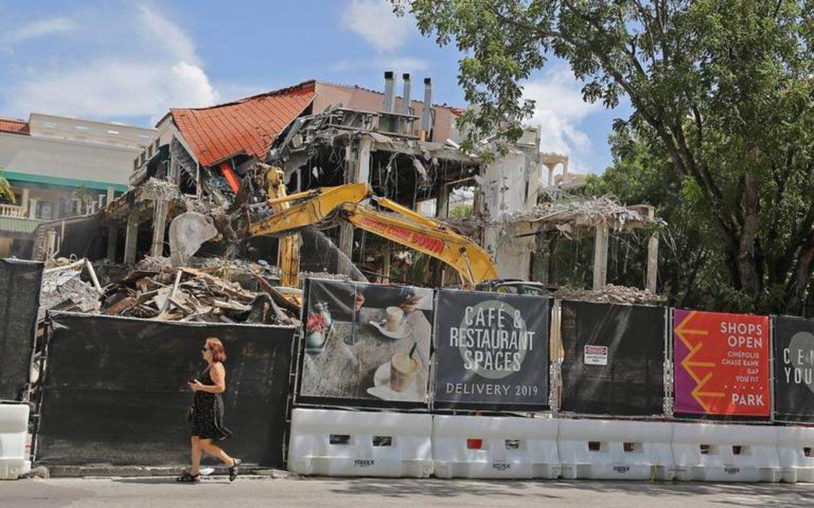 The north wing of the open-air CocoWalk mall in Coconut Grove is being demolished to make way for a new office building.