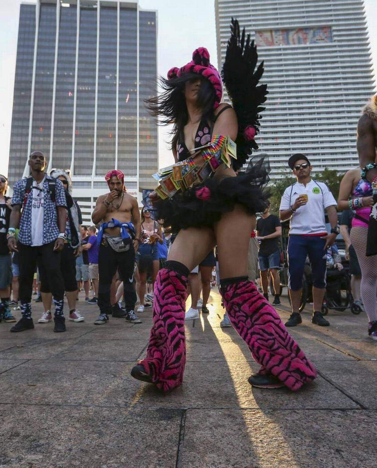 Kat Zhou, 24 from San Francisco, dances during the first day of the Ultra Music Festival in Bayfront Park on Friday, March 24, 2017.