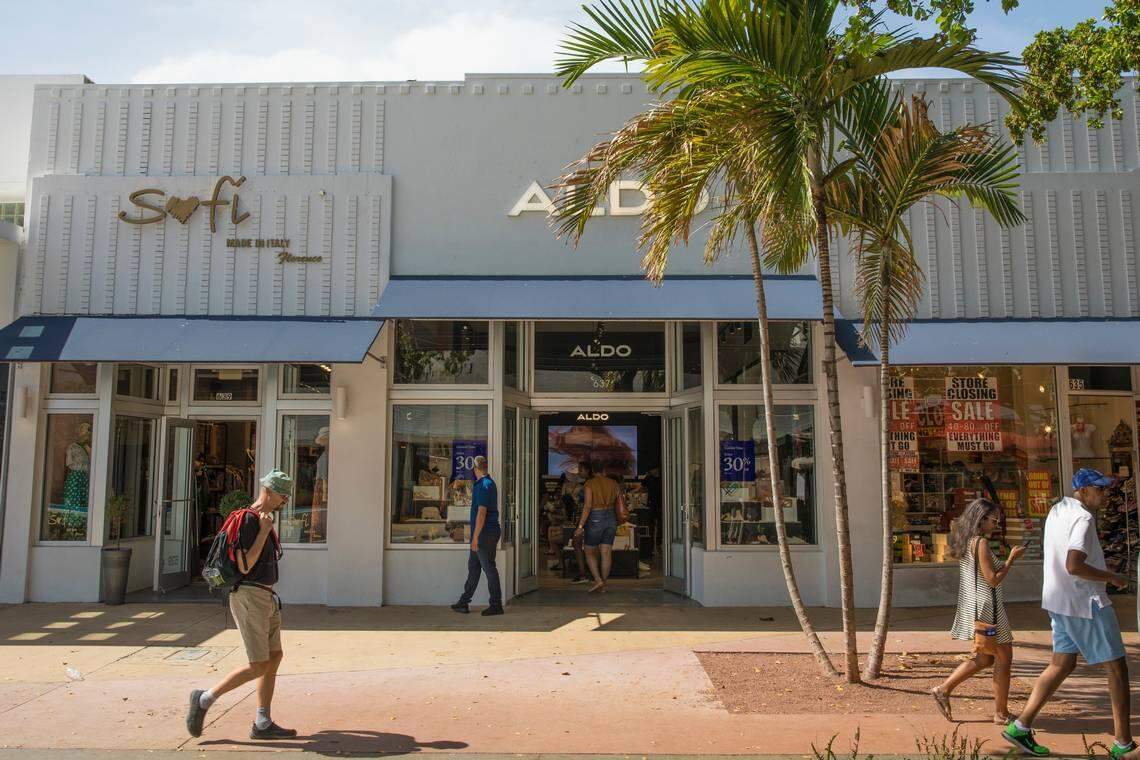 Pedestrians walk by the 635-639 Lincoln Road building on Saturday, June 16, 2018. The property's owner Aldo Group, which paid $35 million for the property in 2016, is raising the rents on the tenants. The women's clothing store Sofi on the left will soon relocate and The Shop shoe store on the right is closing permanently. The Aldo shoe store in the middle will remain open.