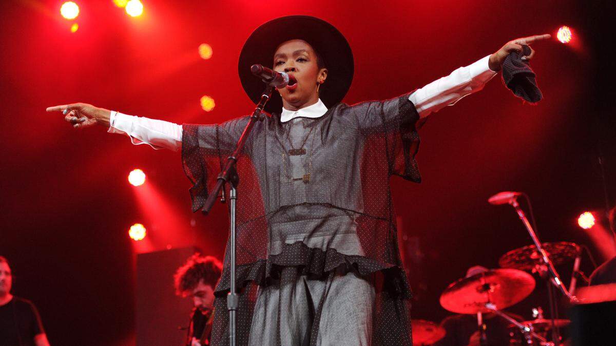 Singer Lauryn Hill performs at Amnesty International’s “Bringing Human Rights Home” Concert at the Barclays Center on Wednesday, Feb. 5, 2014 in New York. (Photo by Evan Agostini/Invision/AP)