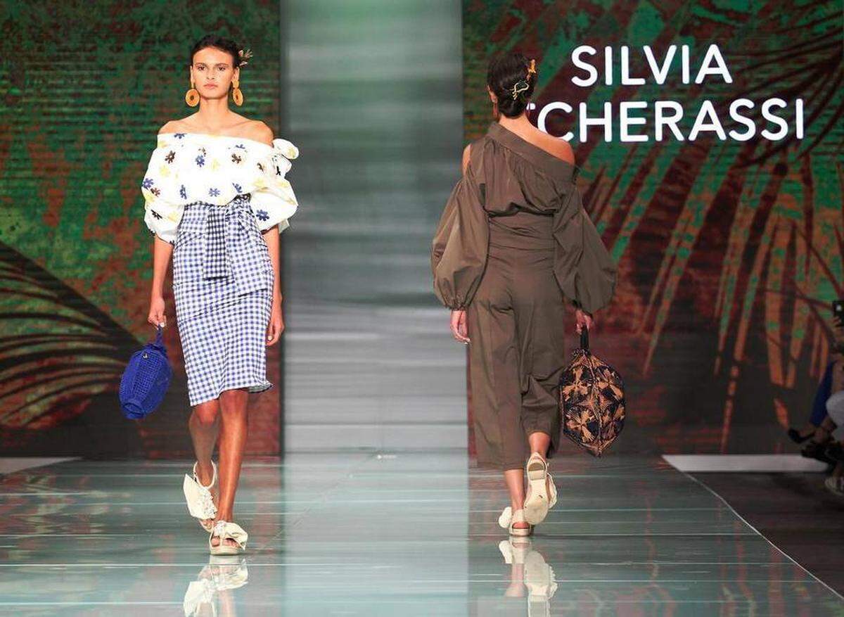 Fashion models work the runway wearing the fashion line by Miami designer Silvia Tcherassi inside the Ice Palace during Miami Fashion Week on Thursday, June 1, 2017.