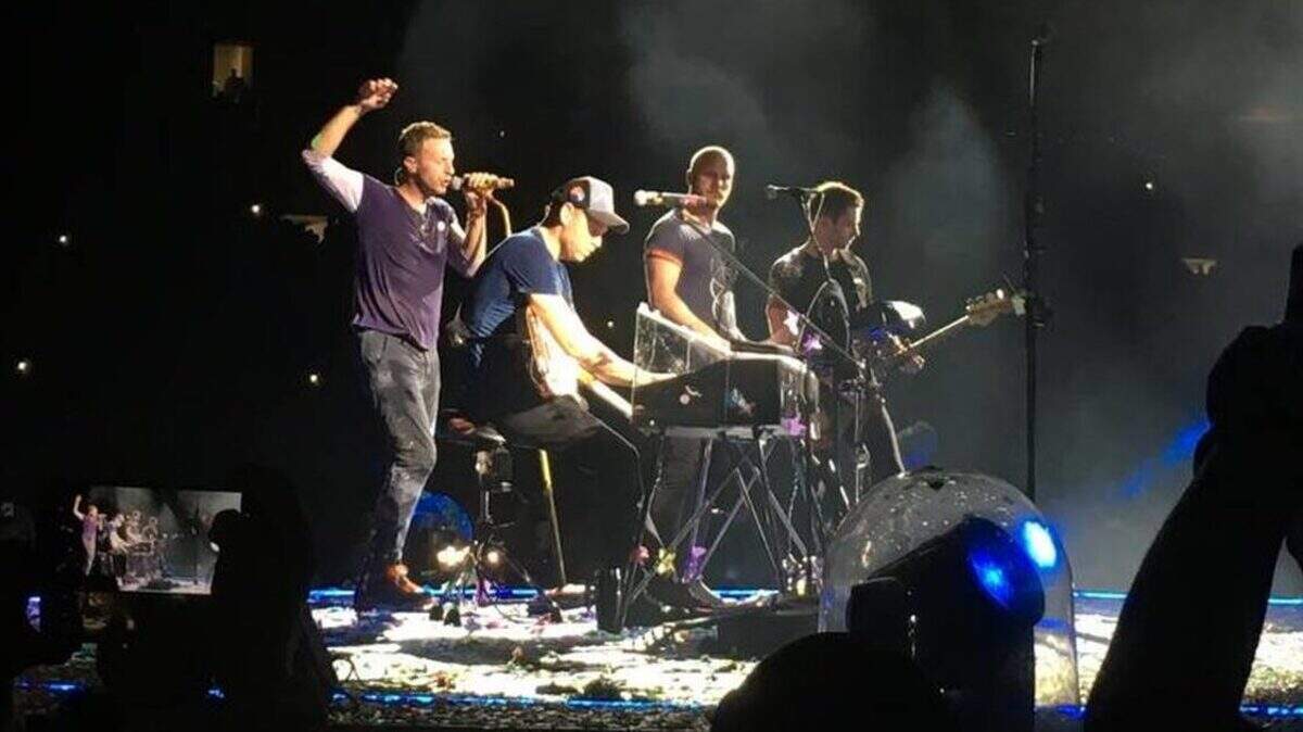 The band Coldplay was forced to cancel its show in Houston last week because of Hurricane Harvey – but wrote a new song for fans there that it premiered in Miami Monday night.