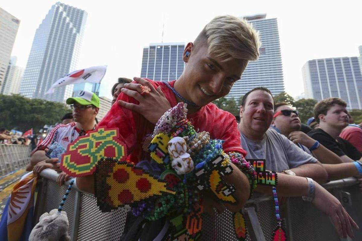 Cory Soukenik, 21, from Cleveland, Ohio, wears beads and "kandi" during the first day of the Ultra Music Festival in Bayfront Park on Friday, March 24, 2017
