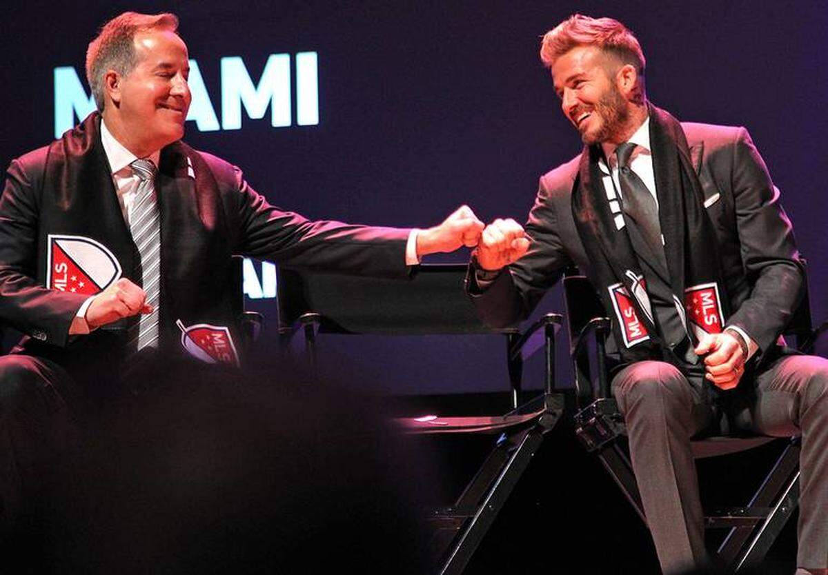Partners of the Inter Miami MLS team Jorge Mas and David Beckham, exchange a “fist bump” during the announcement of the team last January.