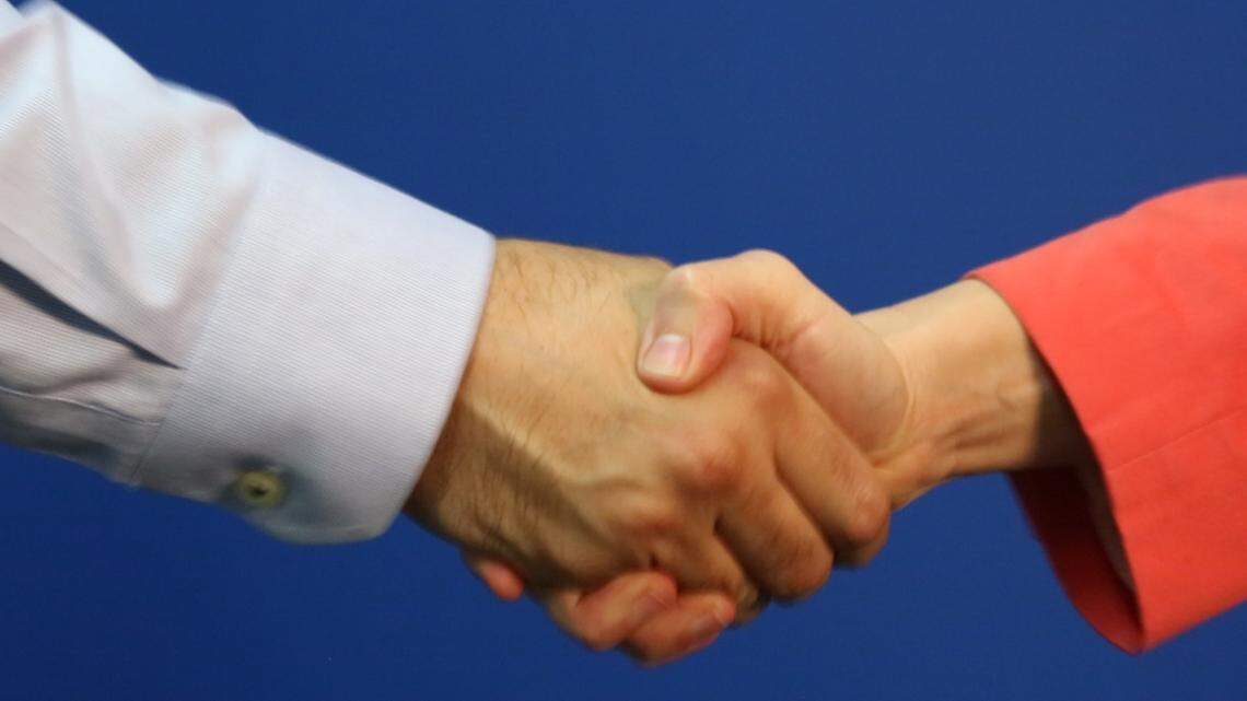 Miss Manners says it’s time to bring back the handshake.