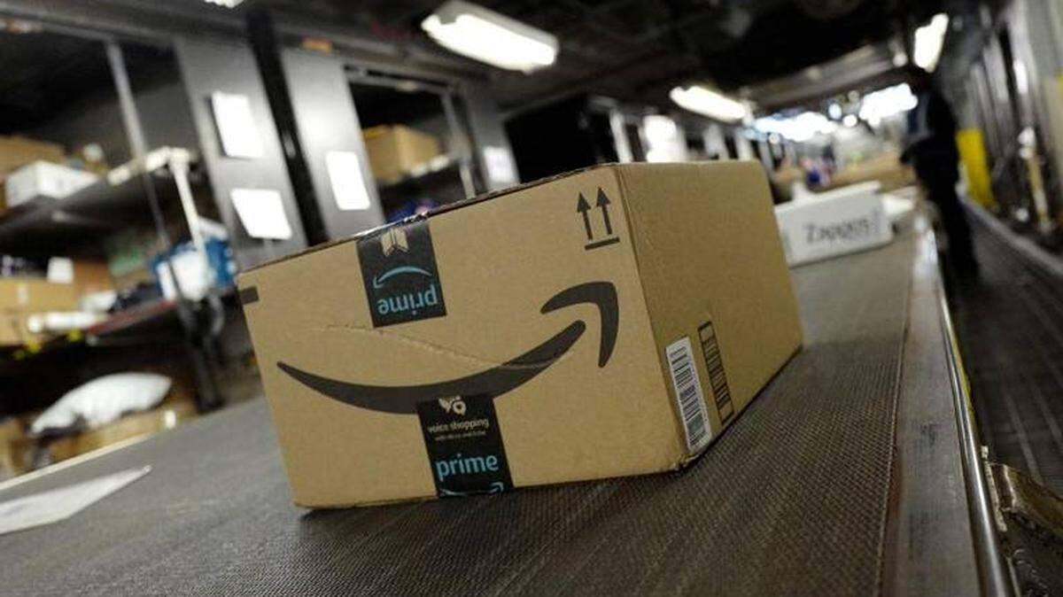 In this Tuesday, May 9, 2017, photo, a package from Amazon Prime moves on a conveyor belt at a UPS facility in New York. Mark Lennihan AP