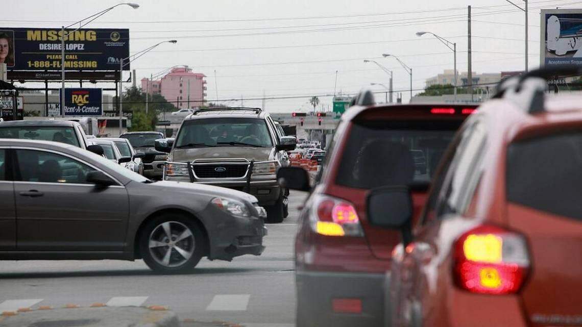 Two cars use their left hand turn signals on Northwest 27th Avenue and Seventh Street in this file photo from June 3, 2017.