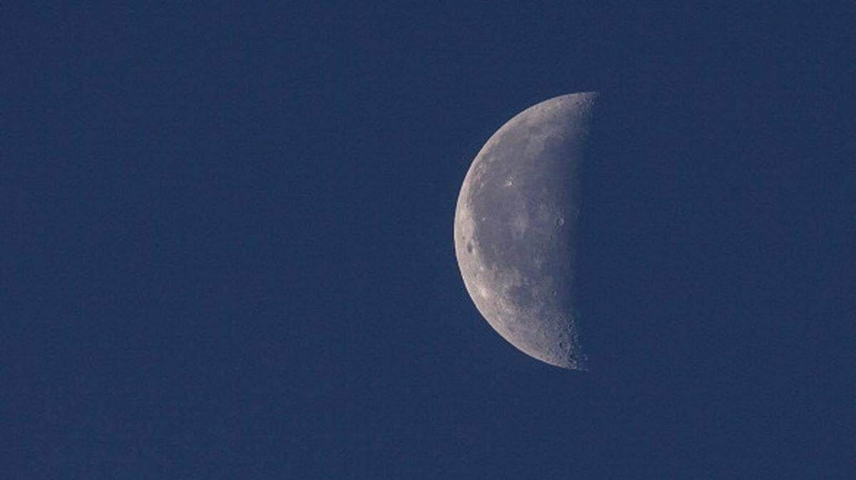 The blue moon is back the weekend of Aug. 20-22, 2021. In this file photo image, the moon is seen from the Somerset Levels in 2013 in Glastonbury, England.