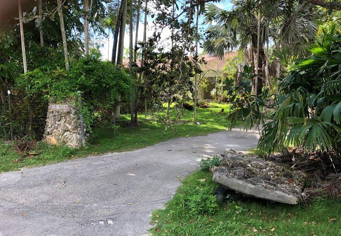 The fence (right) collapsed, knocking over a mailbox.