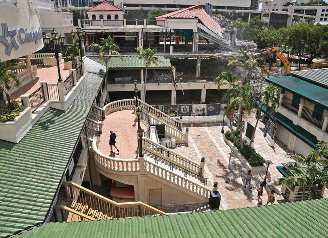 The north wing of the open-air CocoWalk mall in Coconut Grove is being demolished to make way for a new office building. The center pavilion and the staircase at the center of the mall will also be torn down and replaced with a new public plaza.