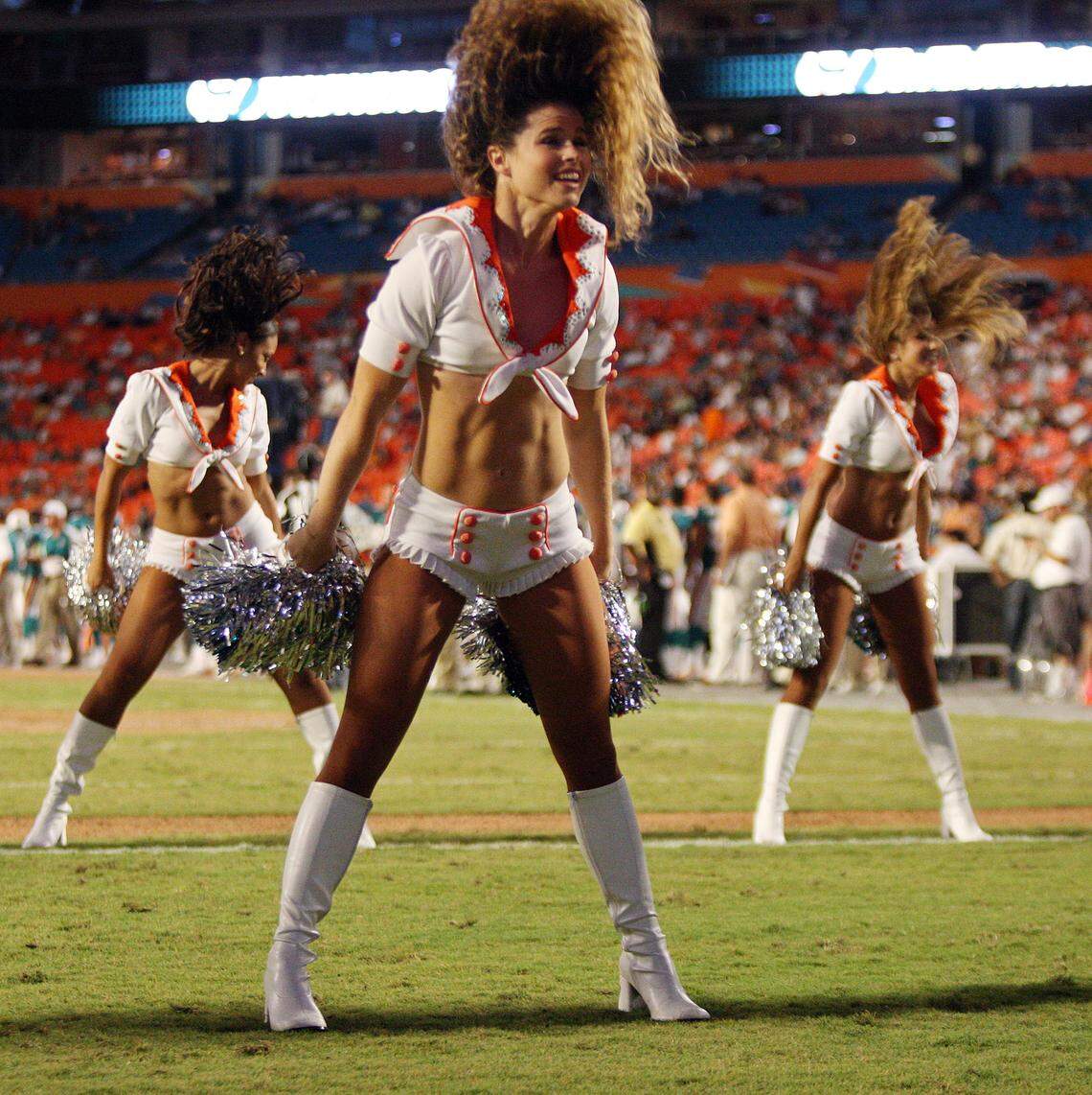 For SPORTS 8/11/07 Photo by Joe Rimkus Jr./ Miami Herald Staff...The Miami Dolphins host  the Jacksonville Jaguars at Dolphin Stadium in Miami..The new Dolphin cheerleaders have their hair flying during a 3rd quarter routine.Photo by Joe Rimkus Jr./ Miami Herald Staff..The new Dolphin cheerleaders have their hair flying during a 3rd quarter routine.