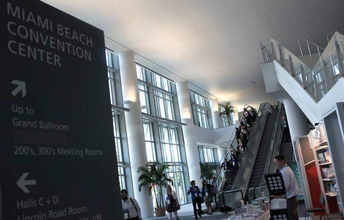 Attendees at a health management convention make their way through the newly renovated lobby area of the Miami Beach Convention Center on Tuesday, Sept. 25, 2018, in Miami Beach.