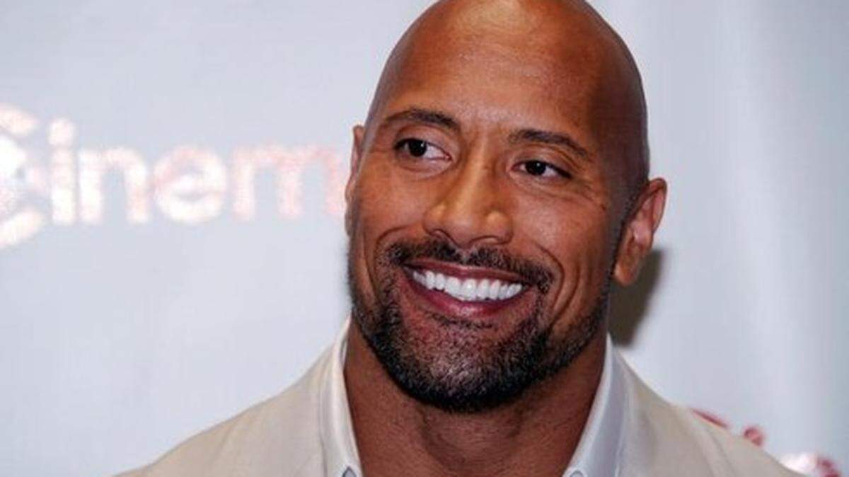 LAS VEGAS, NV - APRIL 23:  Actor Dwayne Johnson, recipient of the Action Star of the Decade Award, arrives at a Paramount Pictures and DreamWorks Animation event at Caesars Palace during the opening night of CinemaCon, the official convention of the National Association of Theatre Owners, April 23, 2012 in Las Vegas, Nevada. Johnson is promoting his upcoming movie, “G.I. Joe: Retaliation.”  (Photo by Ethan Miller/Getty Images)