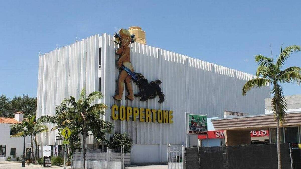 The Coppertone Girl sign was first restored for its move north to the MiMo historic district on Northeast 73rd Street and Biscayne Boulevard in 2008. (Miami Herald File)