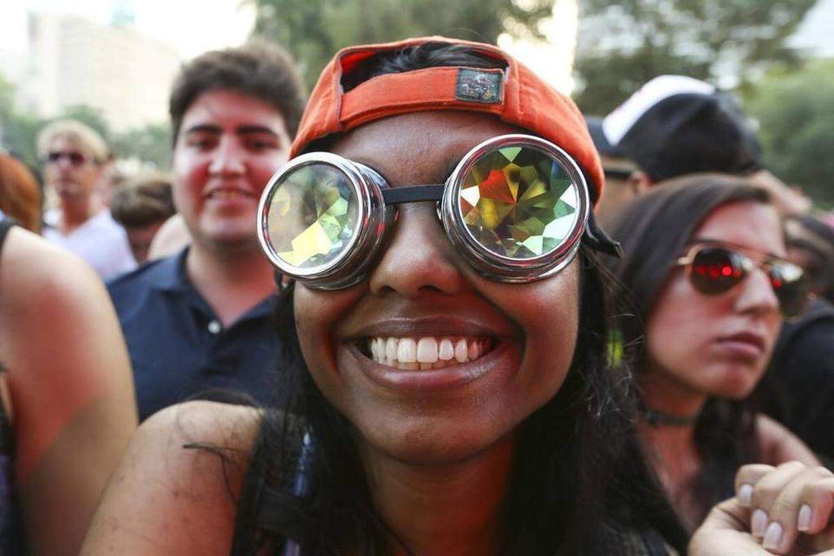 Raisa Ahmed, 21, from Tennessee, wears goggles to the first day of the Ultra Music Festival in Bayfront Park on Friday, March 24, 2017.