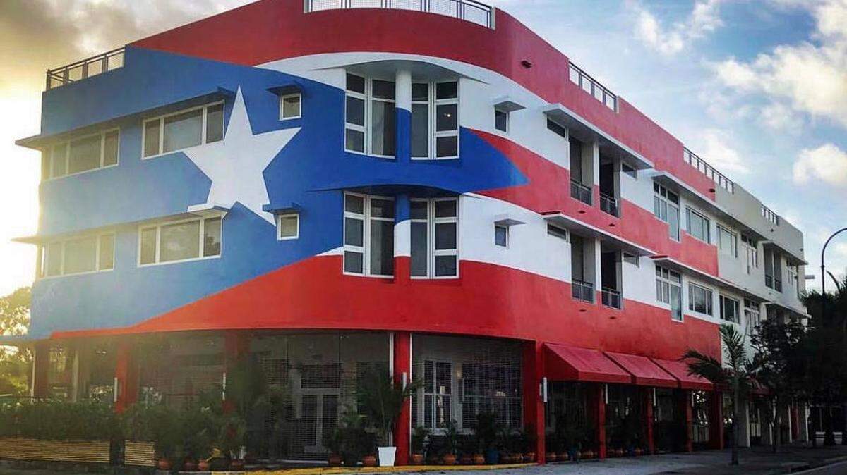 Owners of La Placita, an upcoming Puerto Rican restaurant in Miami’s MiMo district, paid $25,000 to have a famed Puerto Rican muralist paint the building like the Puerto Rican flag. The city says they did not clear it with a historic preservation board that oversees the area.