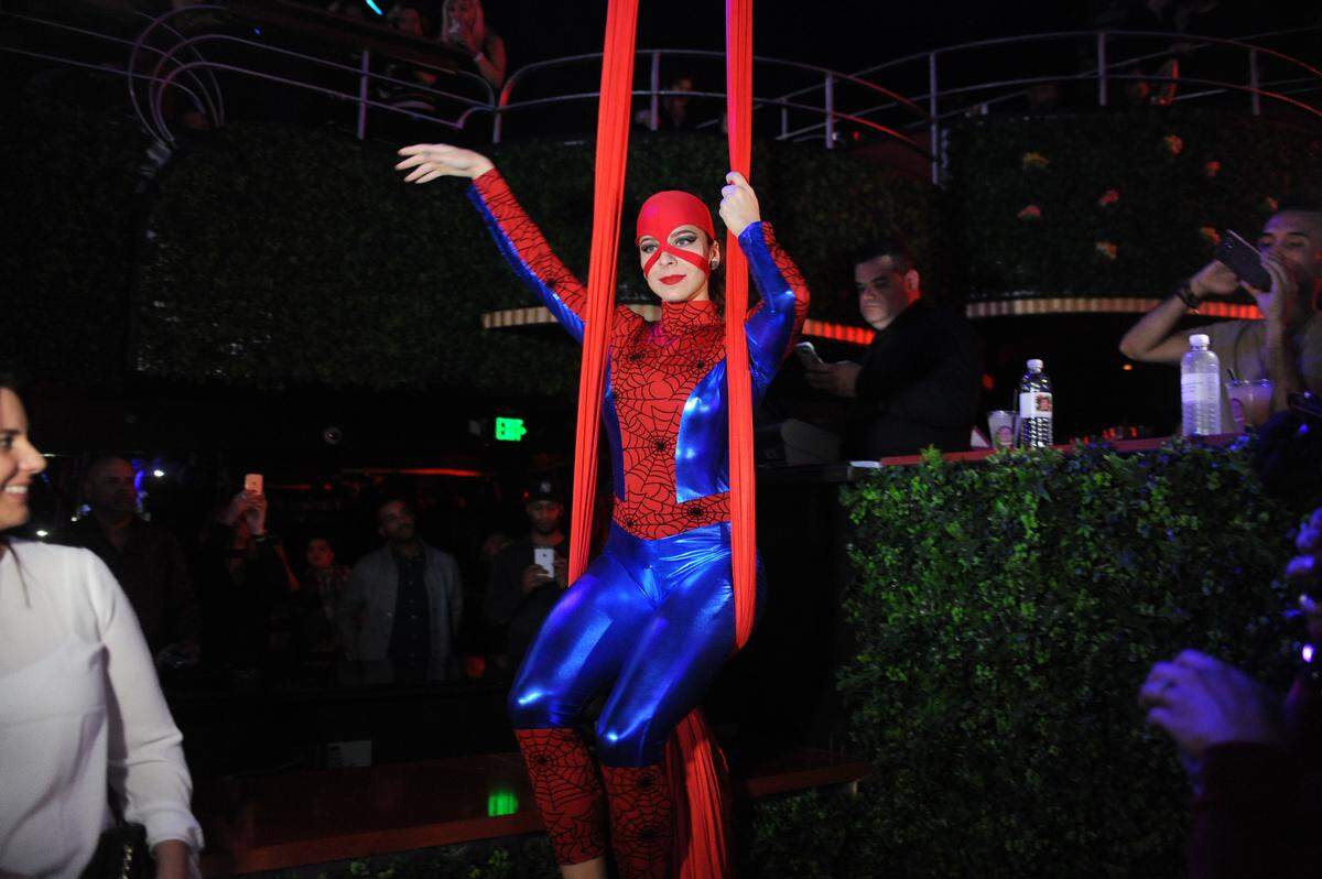 An aerialist does Spiderman at Copa Room