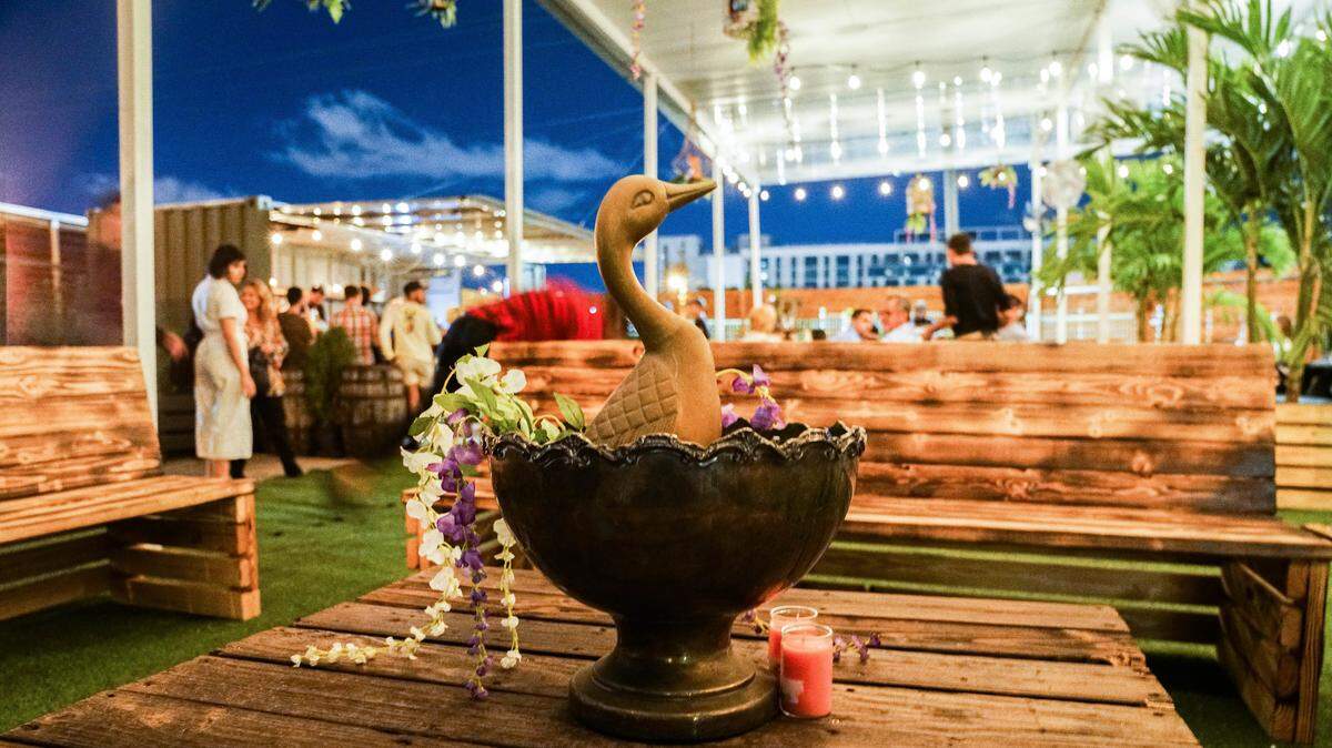 At this indoor-outdoor space, you can trade for cocktails.