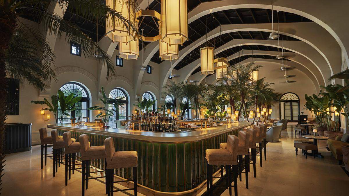 Le Sirenuse Champagne Bar at Four Seasons at The Surf Club takes the hotel lobby bar to a new level of opulence.