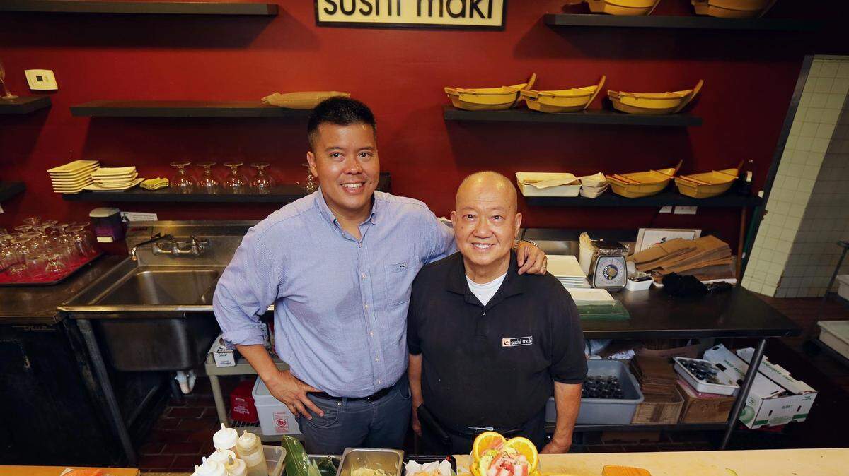Left to right, Abe Ng and his father Allan Ng at the Canton Restaurant in Coral Gables on Saturday, May 27, 2017, for a story about the Ng family, which owns Canton and Sushi Maki restaurants in Miami.